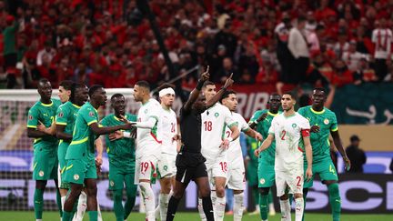 L'arbitre de la finale de la CAN 2026, Jean-Jacques Ndala, entre le Sénégal et le Maroc au Stade Prince Moulay Abdellah Stadium de Rabat, le 18 janvier 2026. (FRANCK FIFE / AFP)
