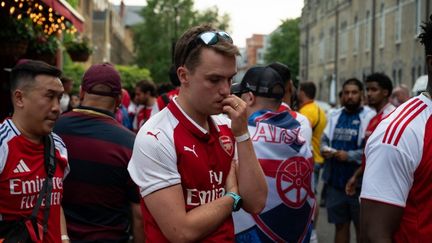Les supporters d'Arsenal, déçus mais dignes, après la finale de la Ligue des champions face au PSG